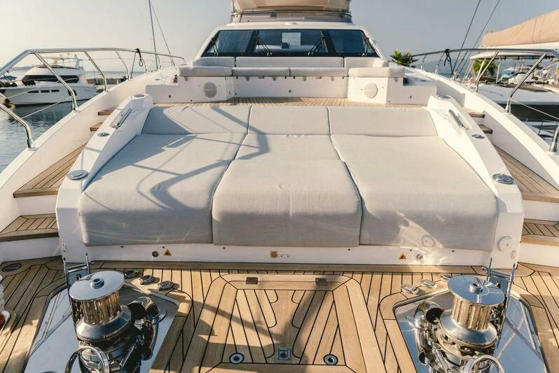 a large white car aboard TAMUSIA Yacht for Sale