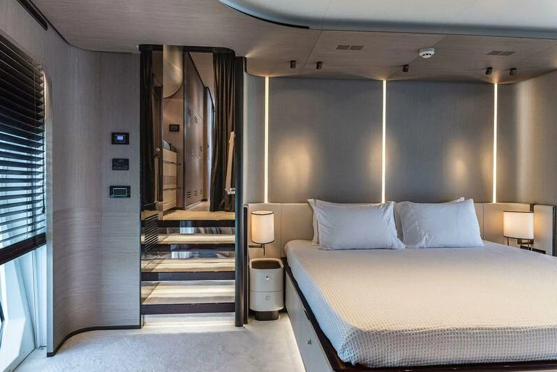 a hotel room with a bed aboard TAMUSIA Yacht for Sale