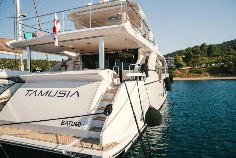 a boat on the water aboard TAMUSIA Yacht for Sale