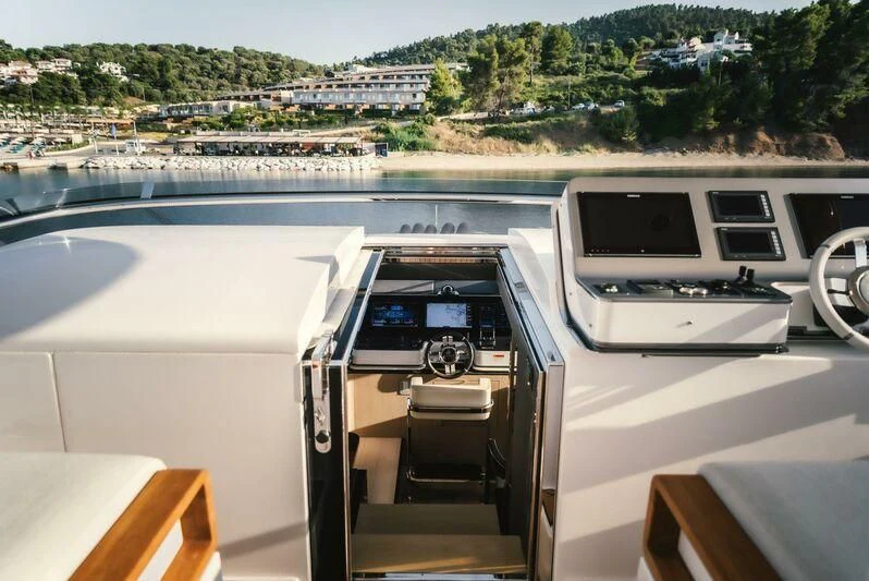 a boat on the water aboard TAMUSIA Yacht for Sale