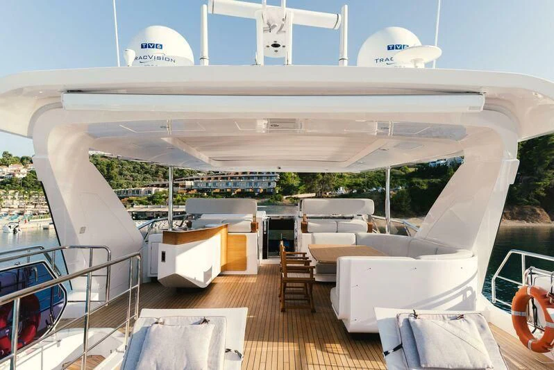 a large white boat with a deck aboard TAMUSIA Yacht for Sale