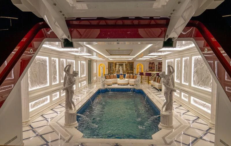 a large indoor swimming pool aboard LEONA Yacht for Sale