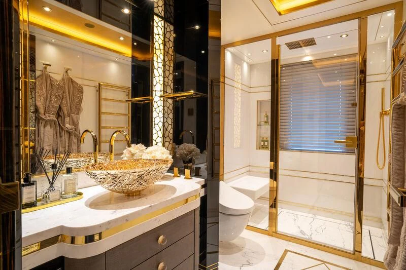 a bathroom with a sink and a mirror aboard LEONA Yacht for Sale