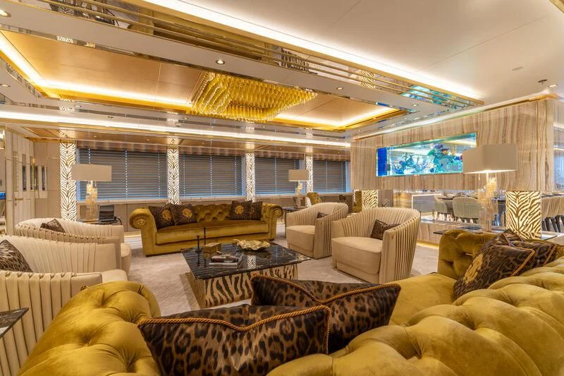 a living room with a large window aboard LEONA Yacht for Sale