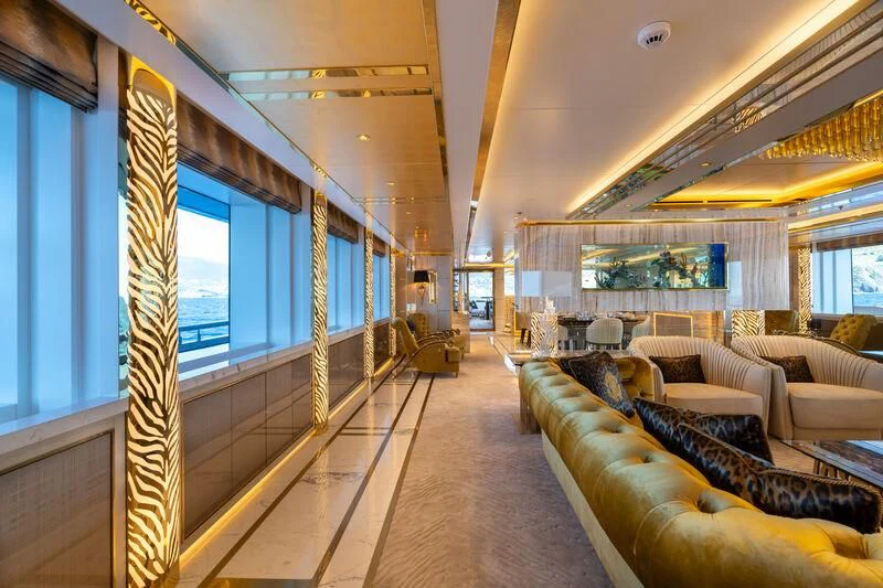 a living room with a large window aboard LEONA Yacht for Sale