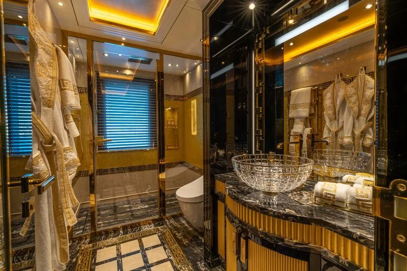 a bathroom with marble counter tops aboard LEONA Yacht for Sale