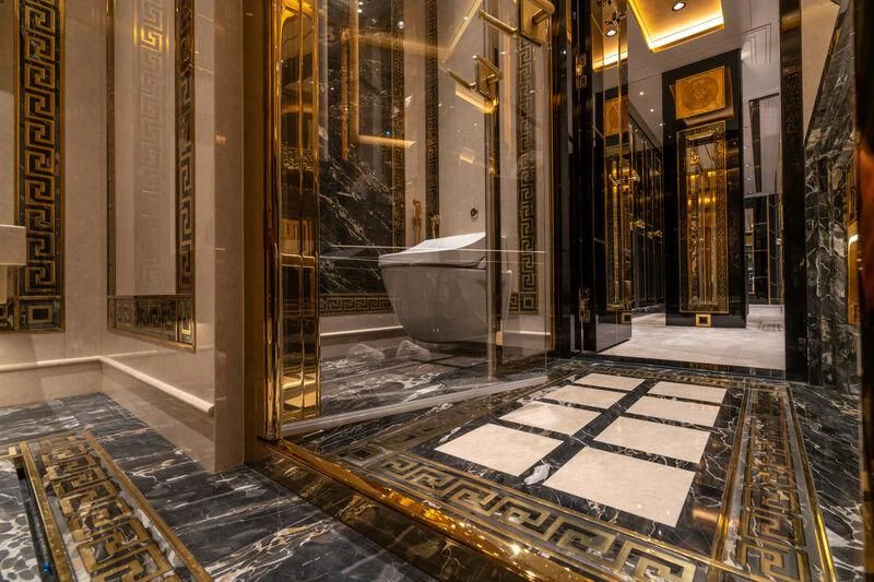 a large room with a fountain aboard LEONA Yacht for Sale
