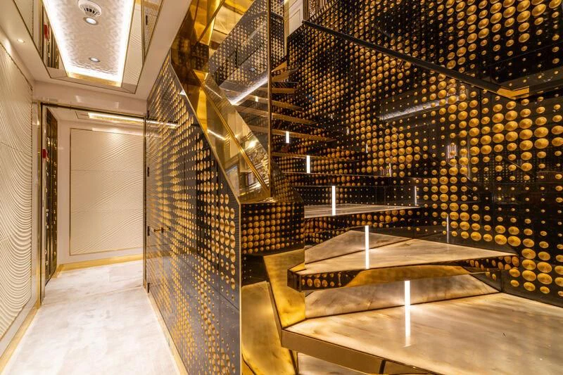 a room with a large wall of metal and metal rods aboard LEONA Yacht for Sale