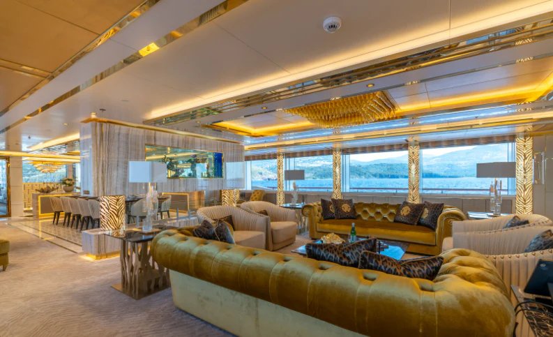 a living room with a large window aboard LEONA Yacht for Sale
