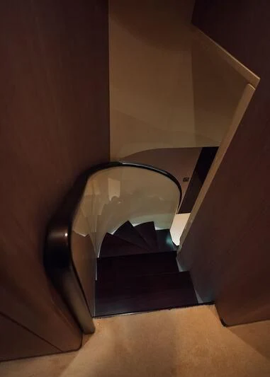 a chair in a room aboard AZIMUT GRANDE 27/16 Yacht for Sale