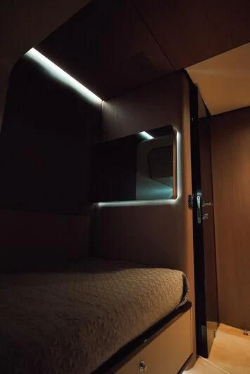 a bed in a room aboard AZIMUT GRANDE 27/16 Yacht for Sale