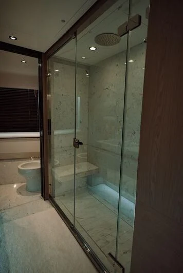 a shower unit in a bathroom aboard AZIMUT GRANDE 27/16 Yacht for Sale