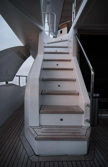 a staircase with a railing aboard AZIMUT GRANDE 27/16 Yacht for Sale