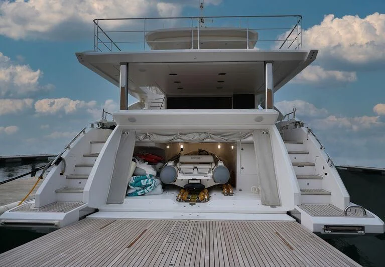 a large white boat on a dock aboard AZIMUT GRANDE 27/16 Yacht for Sale