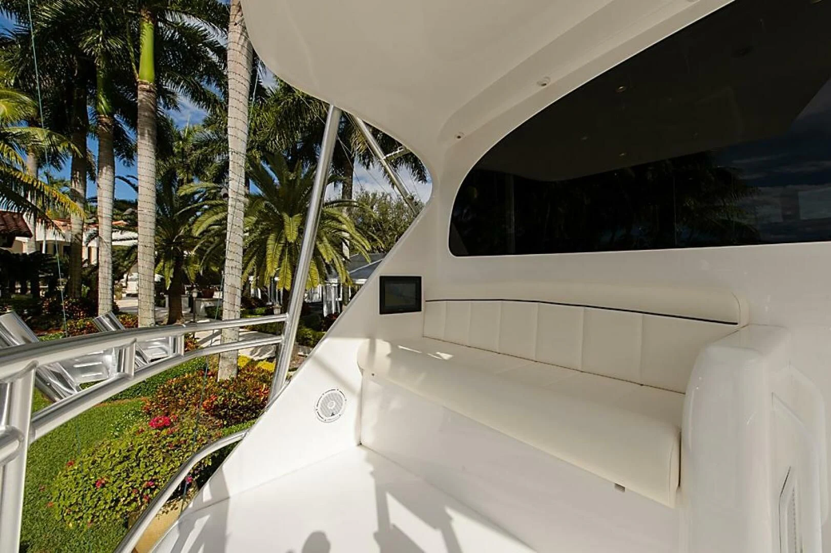a white car parked in a parking lot aboard INSTIGATOR Yacht for Sale