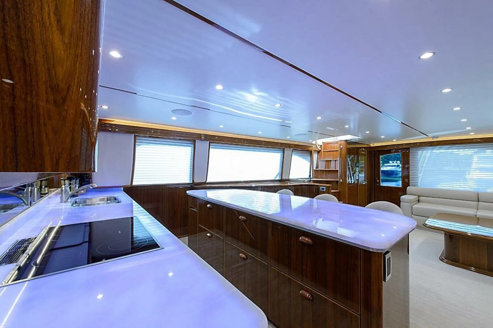 a kitchen with a large island aboard INSTIGATOR Yacht for Sale