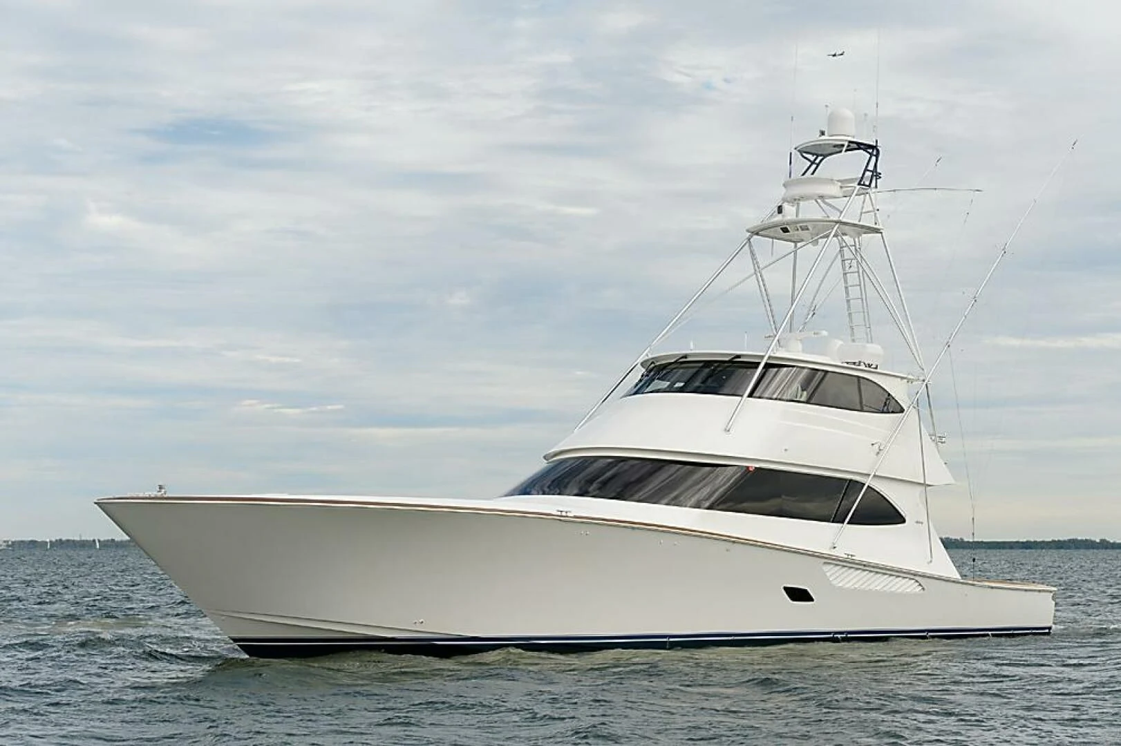 a white yacht in the water aboard INSTIGATOR Yacht for Sale