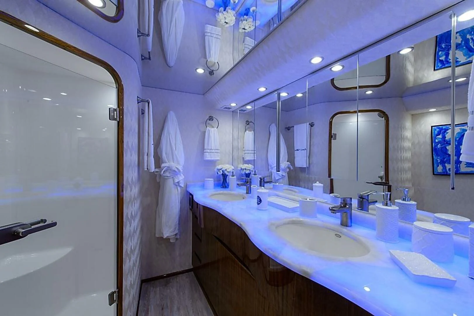 a bathroom with a sink and a mirror aboard INSTIGATOR Yacht for Sale