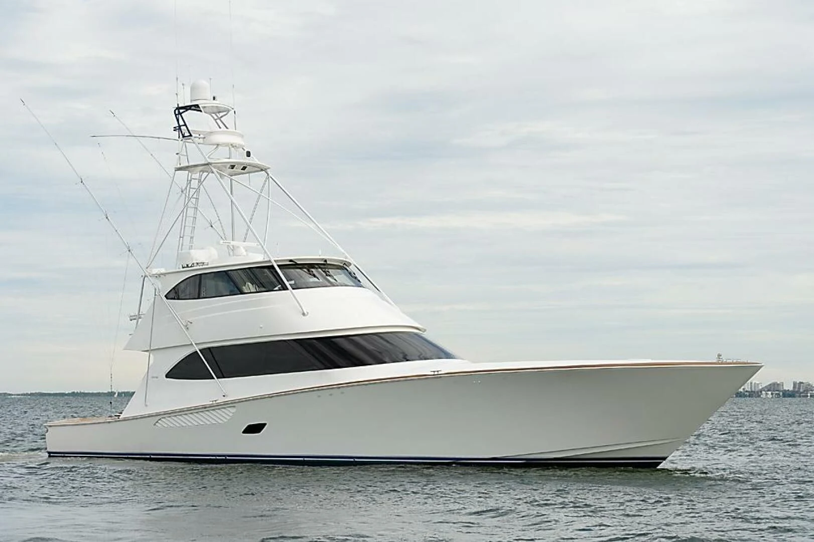 a white yacht in the water aboard INSTIGATOR Yacht for Sale