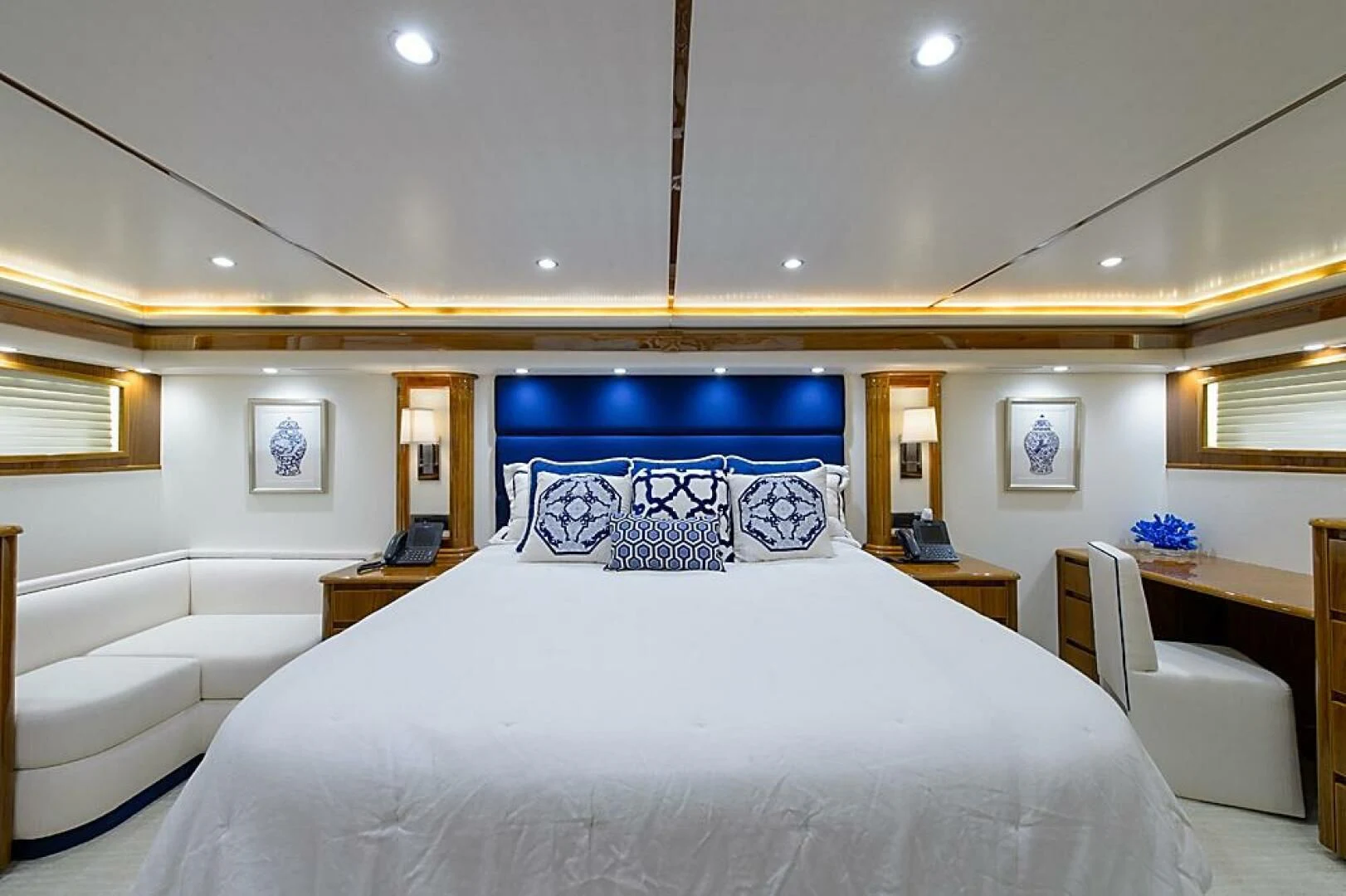 a large bedroom with a large bed aboard INSTIGATOR Yacht for Sale
