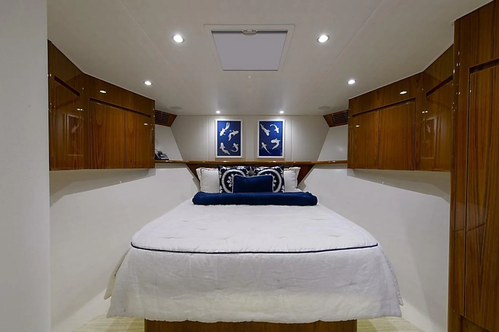 a bed in a room aboard INSTIGATOR Yacht for Sale