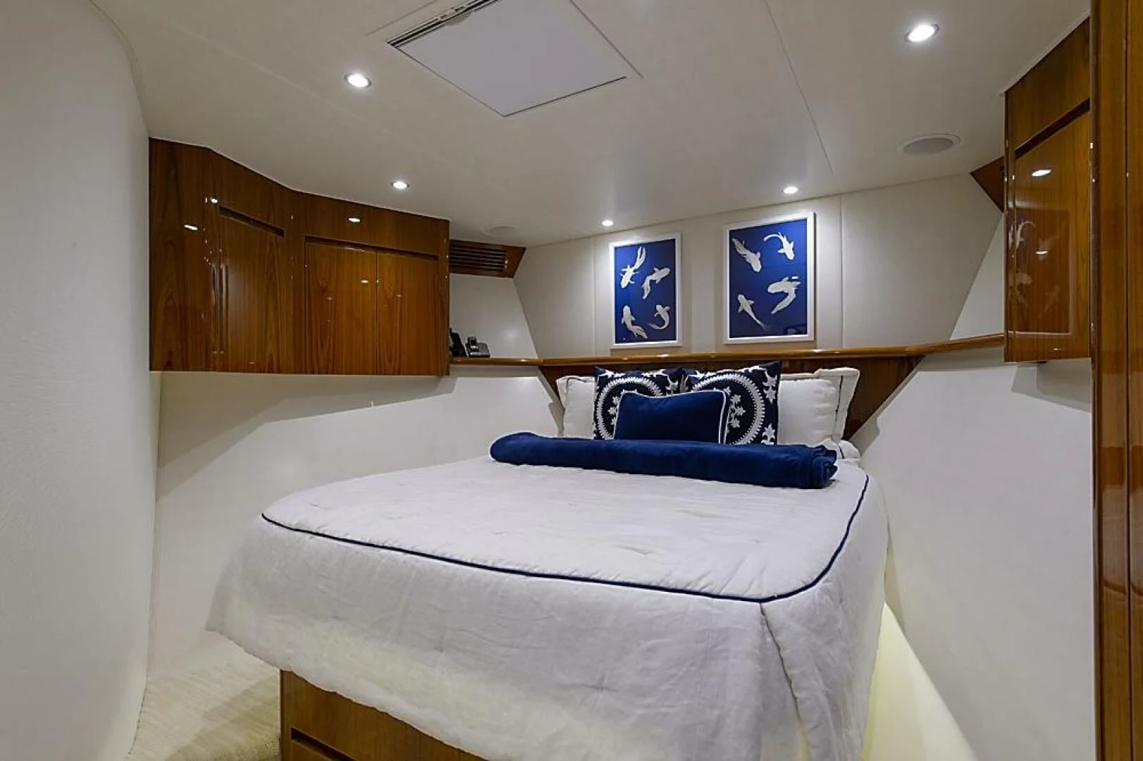 a bed in a room aboard INSTIGATOR Yacht for Sale