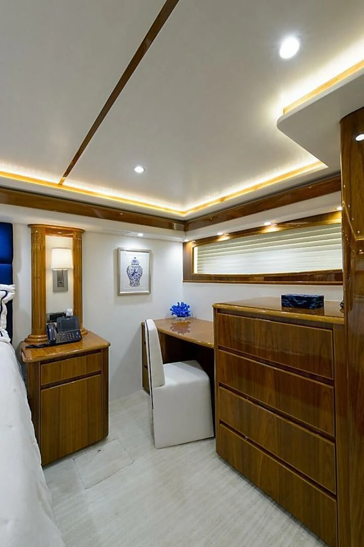 a room with a desk and a chair aboard INSTIGATOR Yacht for Sale