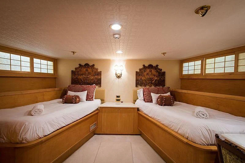 a couple of beds in a hotel room aboard CASABELLA Yacht for Sale