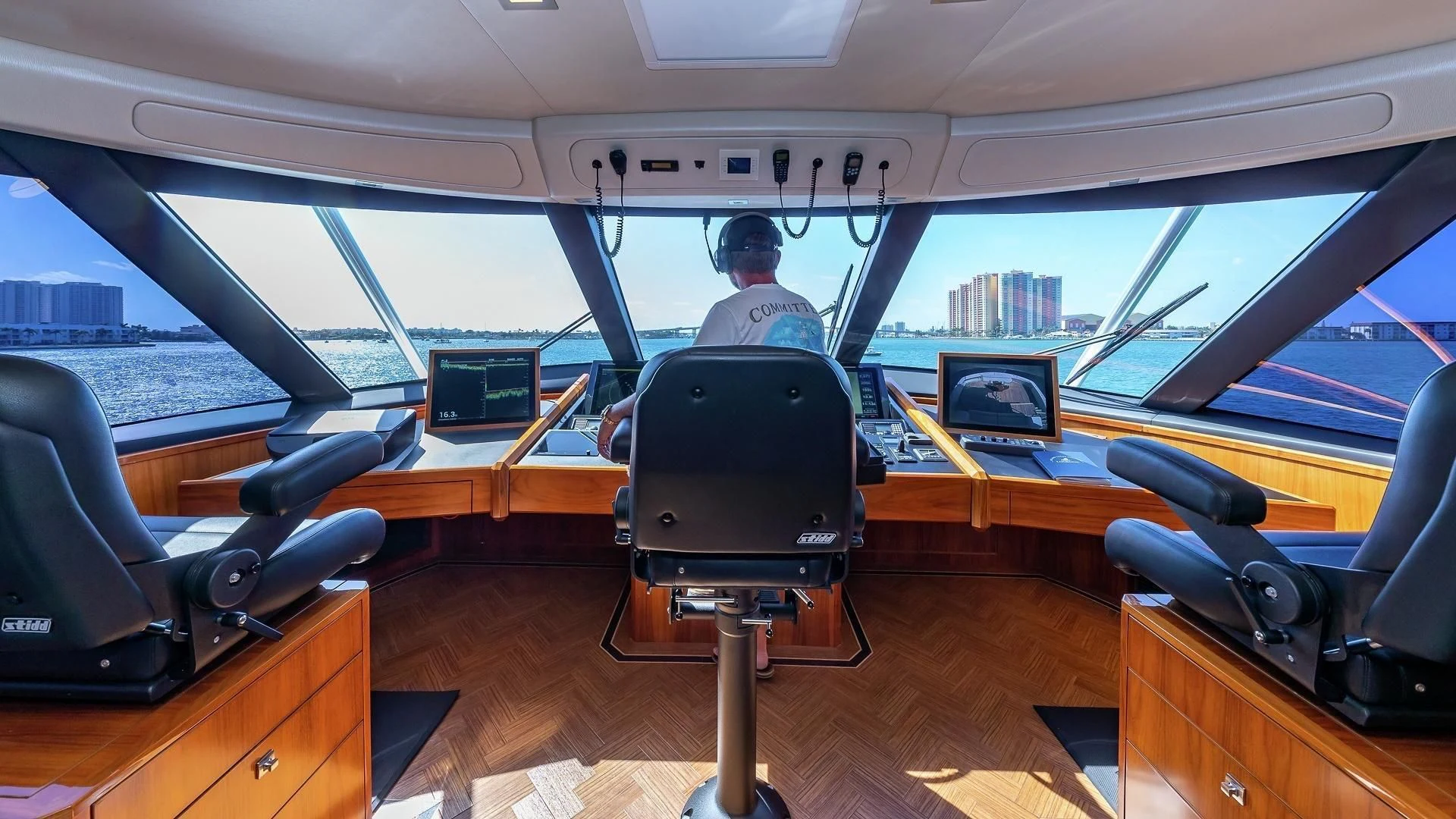 a person sitting in a vehicle aboard AUSSIE RULES Yacht for Sale