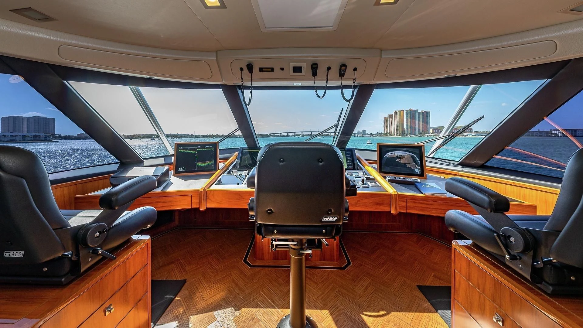 inside of a vehicle with a desk and chairs and a large window aboard AUSSIE RULES Yacht for Sale