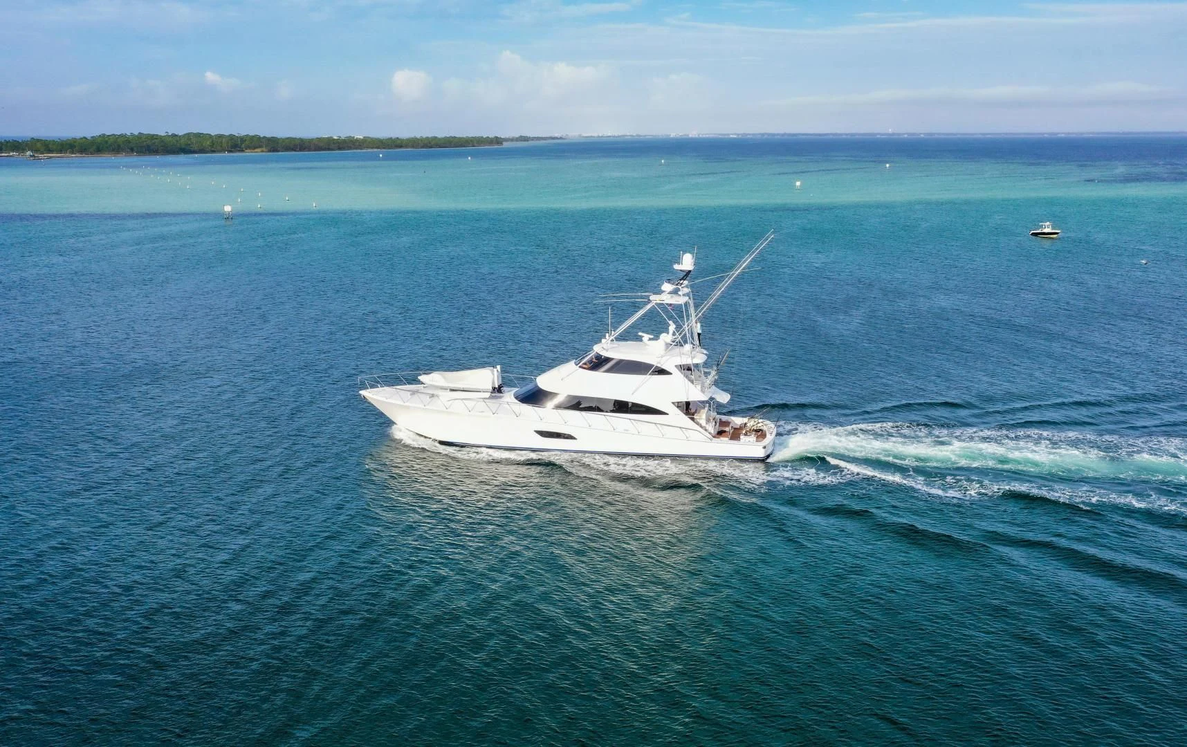 a white boat in the water aboard AUSSIE RULES Yacht for Sale