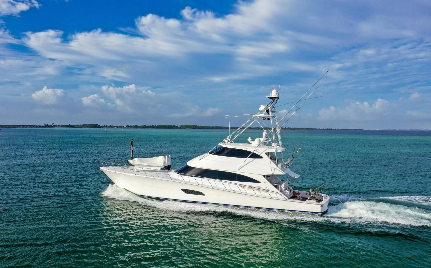 a white boat in the water aboard AUSSIE RULES Yacht for Sale