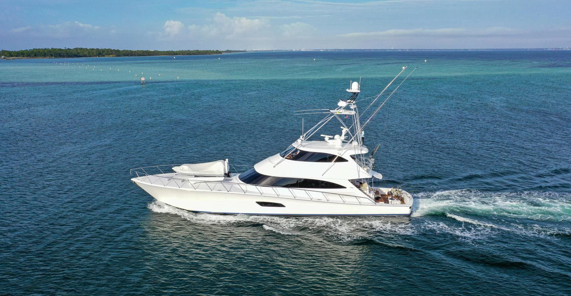 a white boat in the water aboard AUSSIE RULES Yacht for Sale