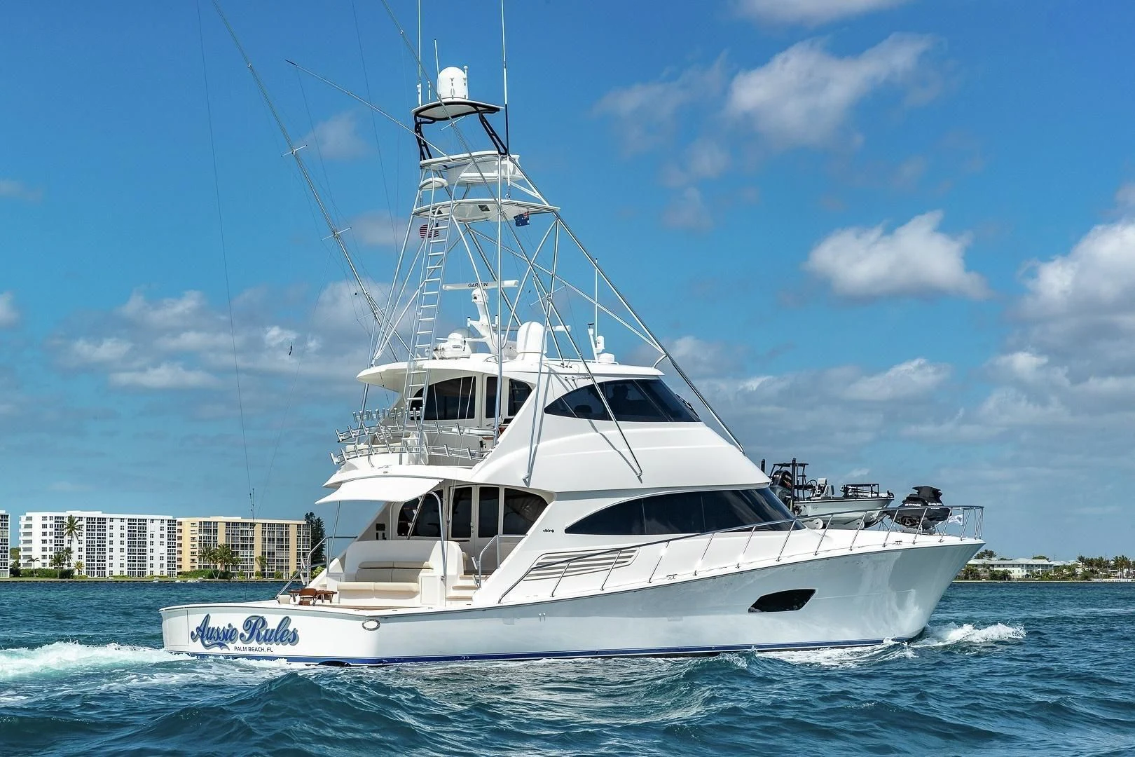 a white yacht on the water aboard AUSSIE RULES Yacht for Sale