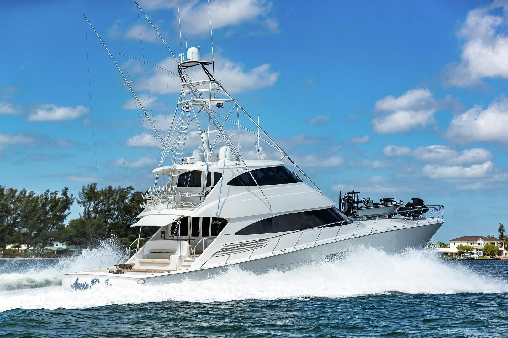 a white yacht on water aboard AUSSIE RULES Yacht for Sale
