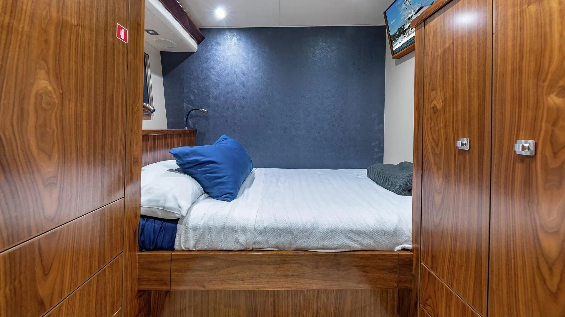 a bed in a room aboard AUSSIE RULES Yacht for Sale