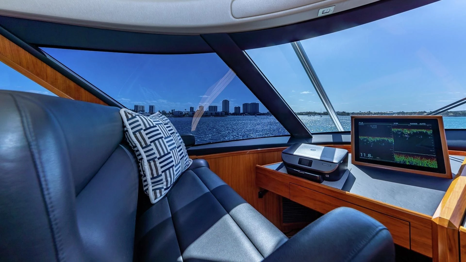 a room with a couch and a tv aboard AUSSIE RULES Yacht for Sale