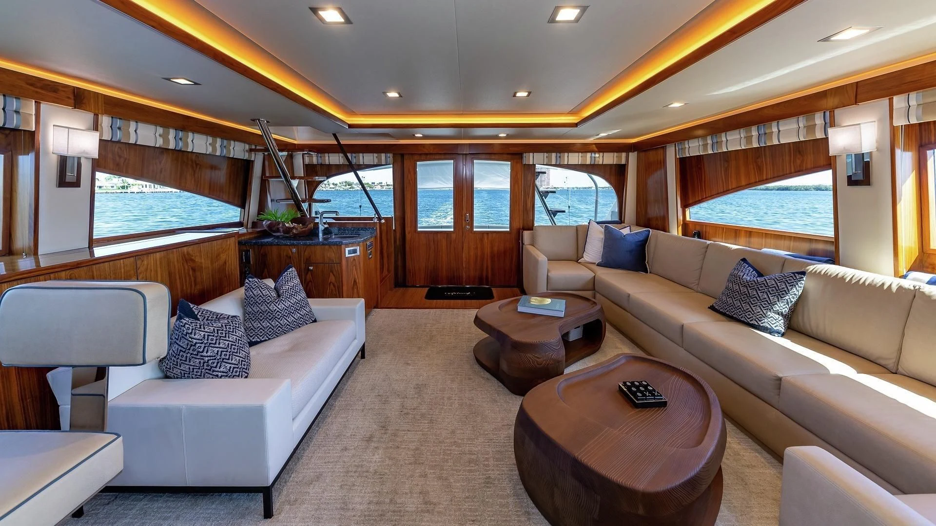 a living room with a large window aboard AUSSIE RULES Yacht for Sale