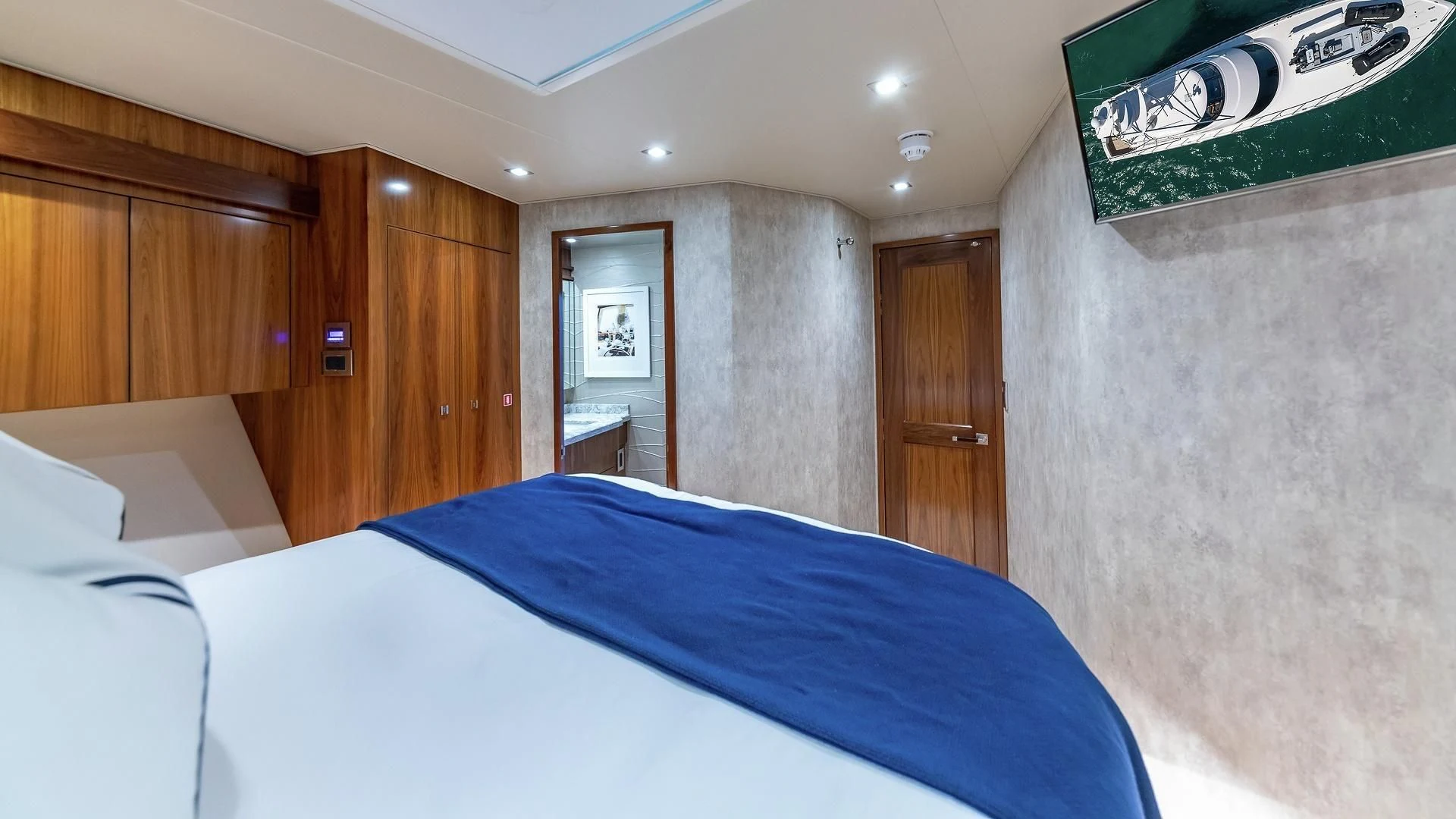 a bed in a room aboard AUSSIE RULES Yacht for Sale