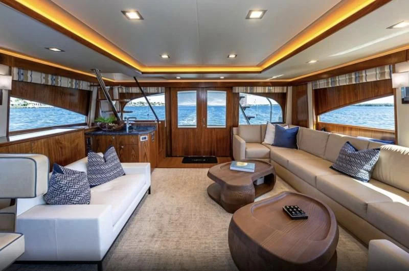 a living room with a large bed aboard AUSSIE RULES Yacht for Sale