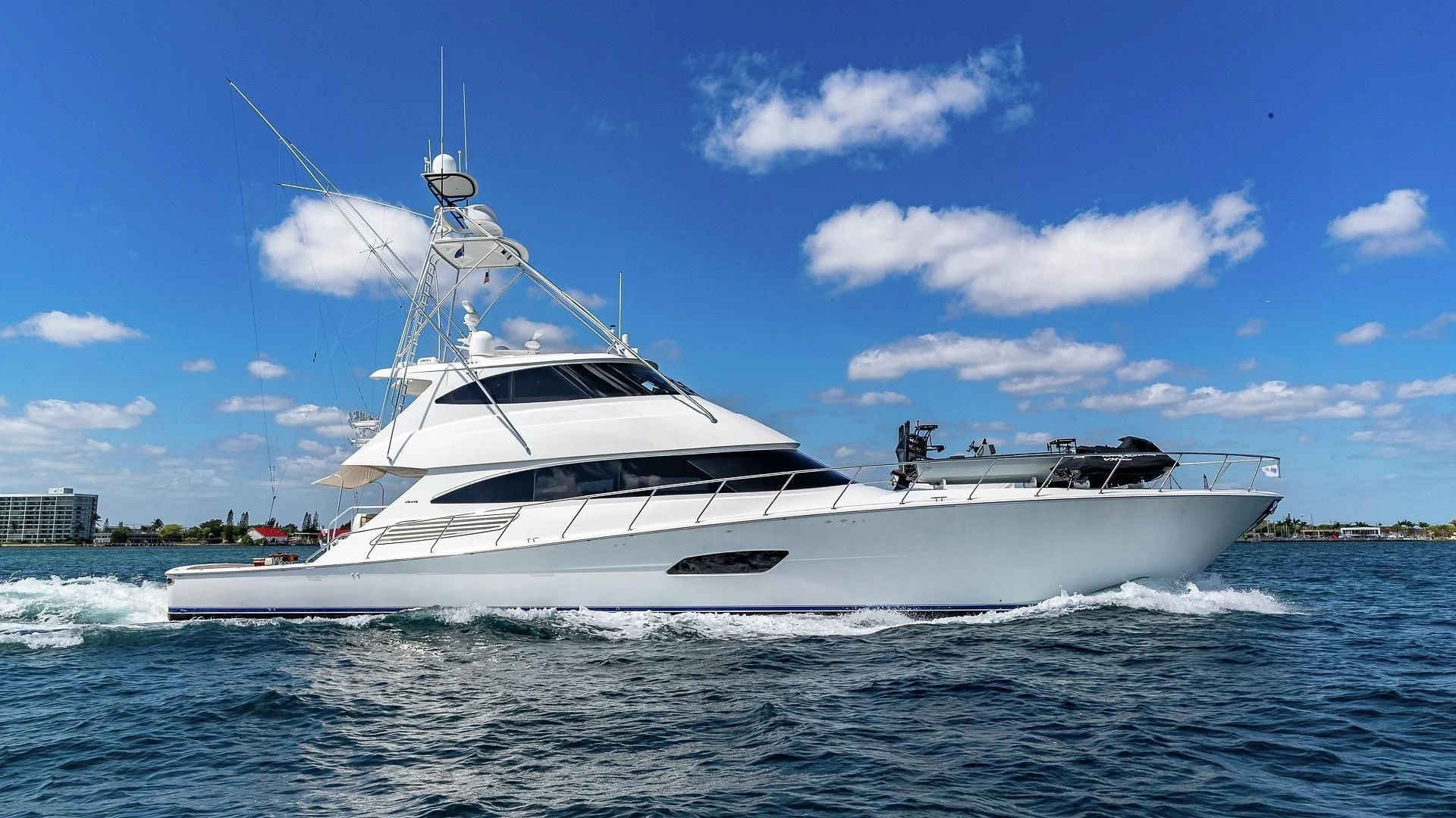 a white yacht on the water aboard AUSSIE RULES Yacht for Sale