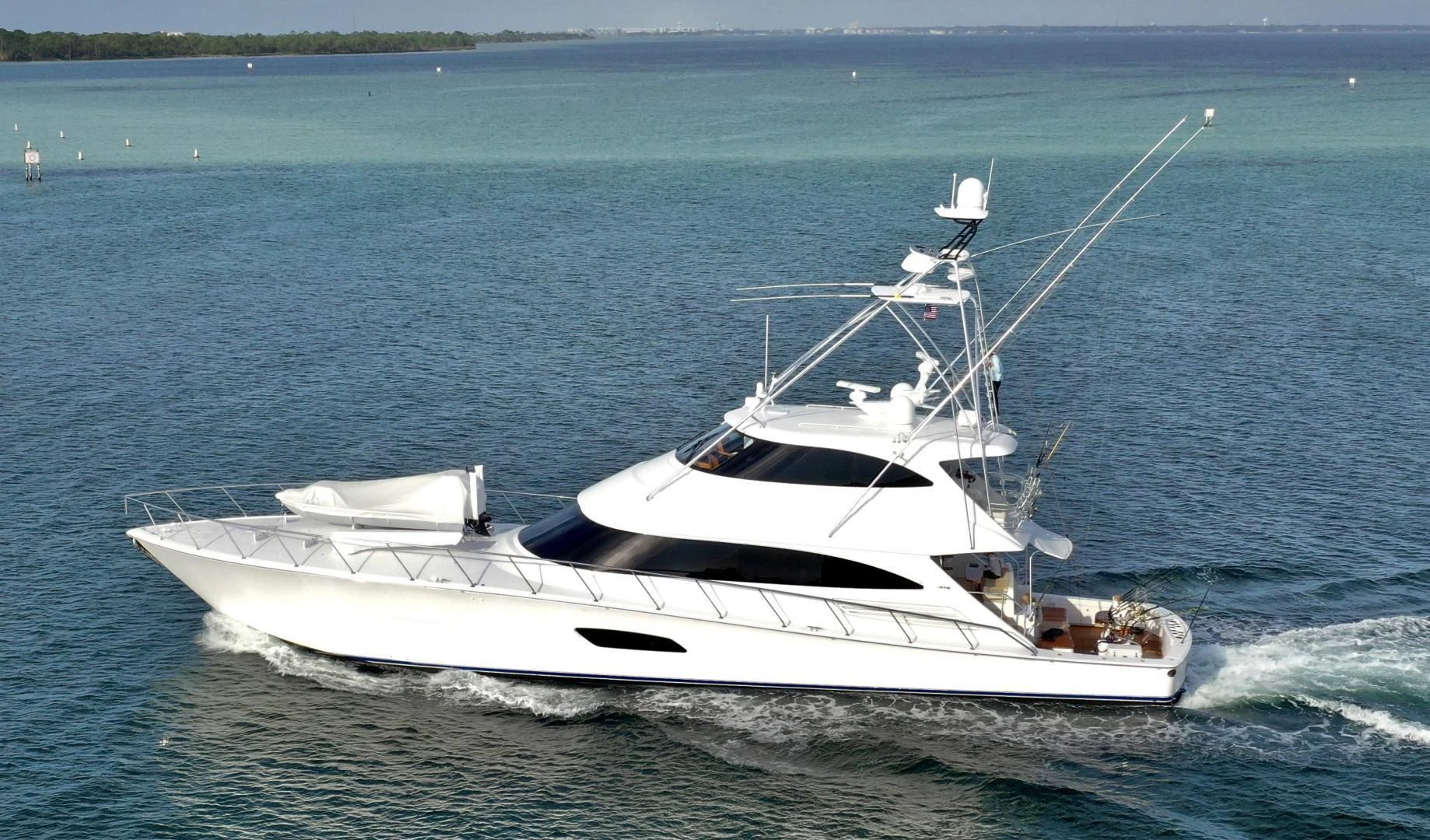 a white boat in the water aboard AUSSIE RULES Yacht for Sale