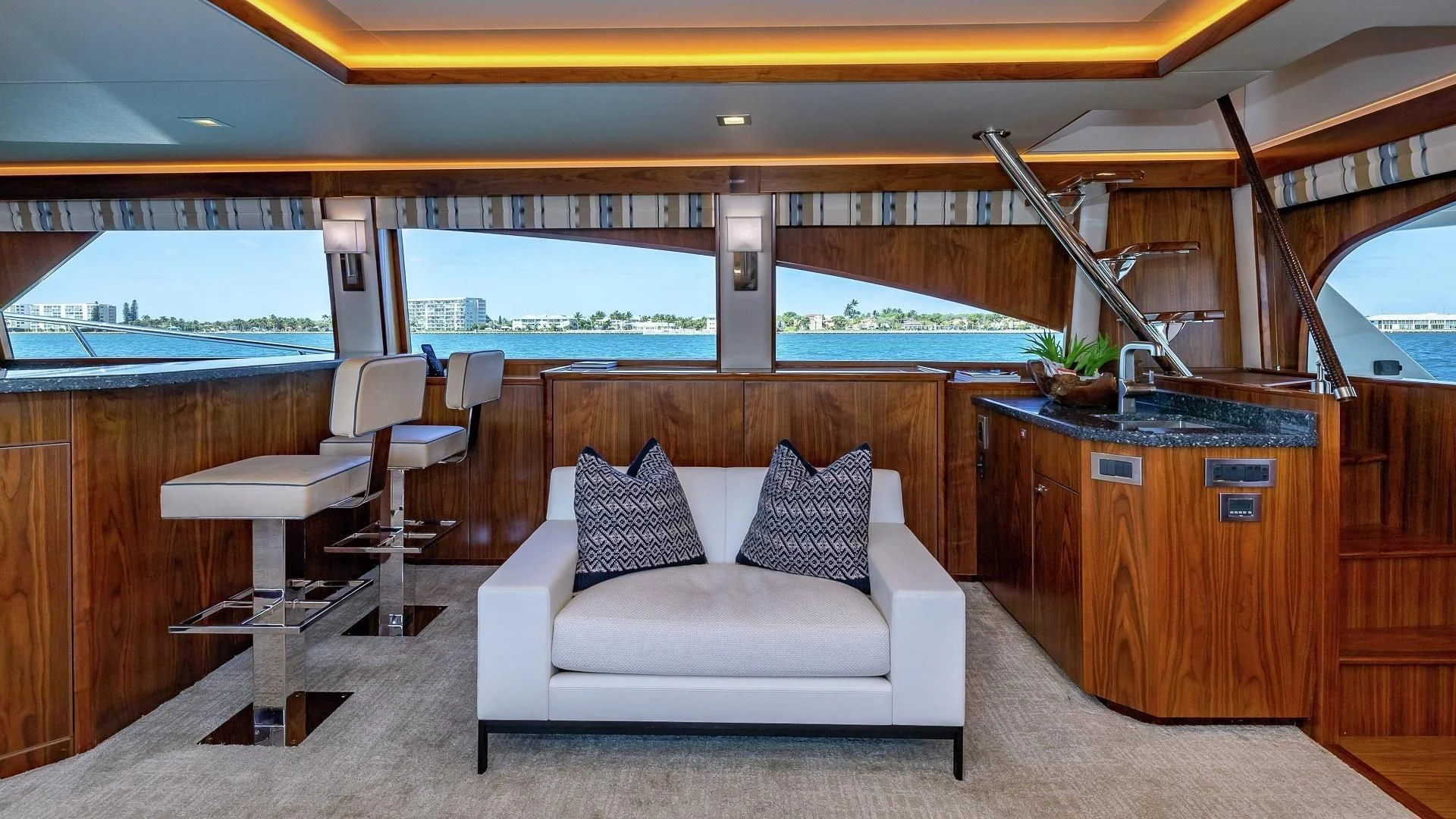a living room with a couch and a table aboard AUSSIE RULES Yacht for Sale