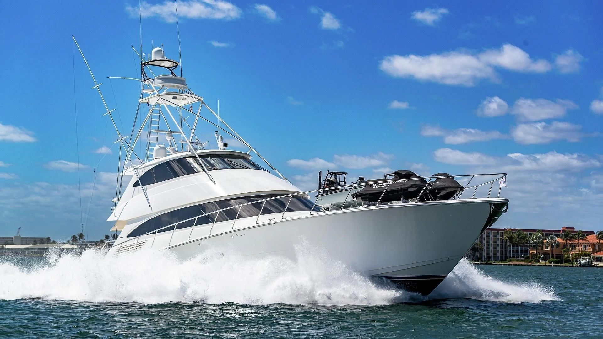 a white yacht on the water aboard AUSSIE RULES Yacht for Sale