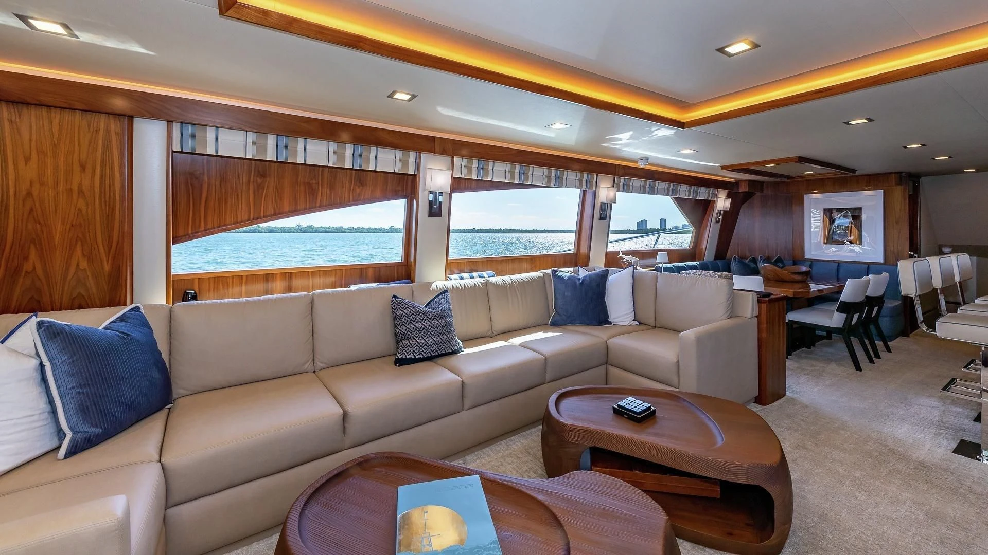 a living room with a large window aboard AUSSIE RULES Yacht for Sale