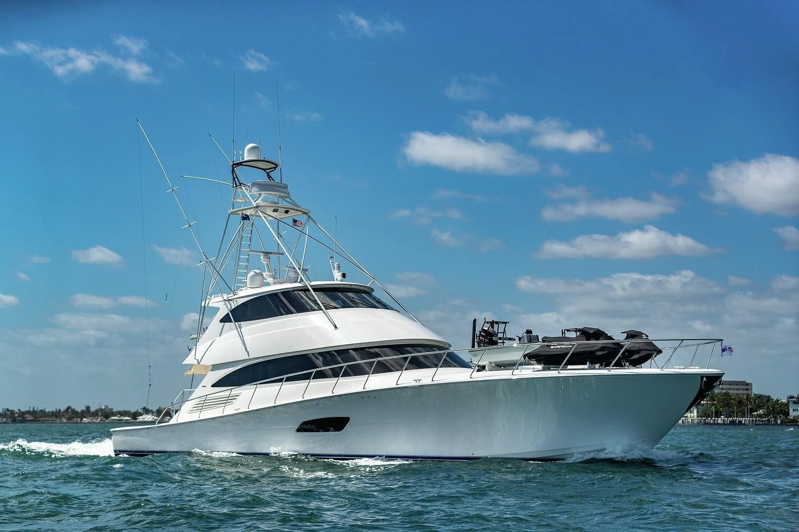 a white yacht on the water aboard AUSSIE RULES Yacht for Sale