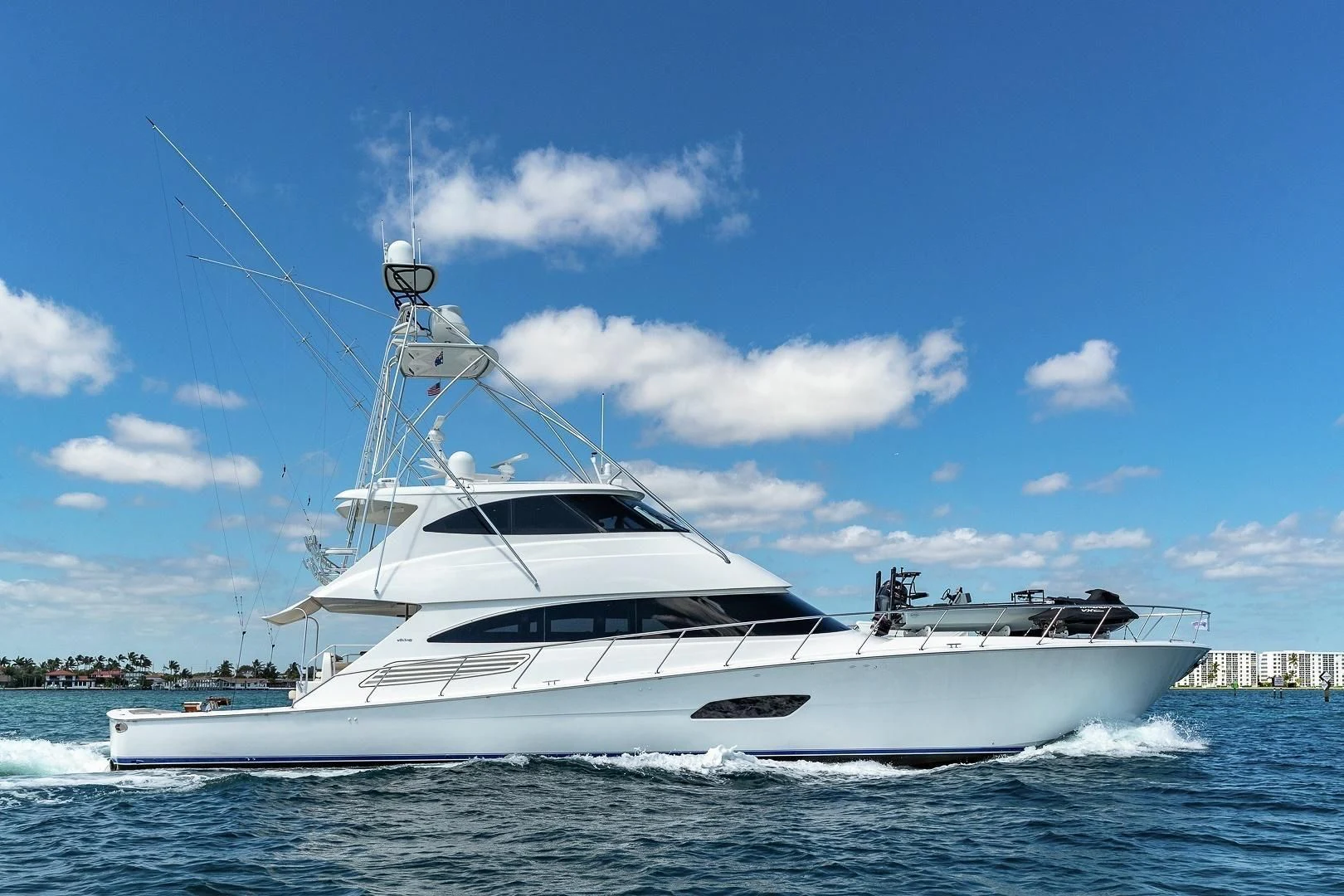 a white yacht on the water aboard AUSSIE RULES Yacht for Sale