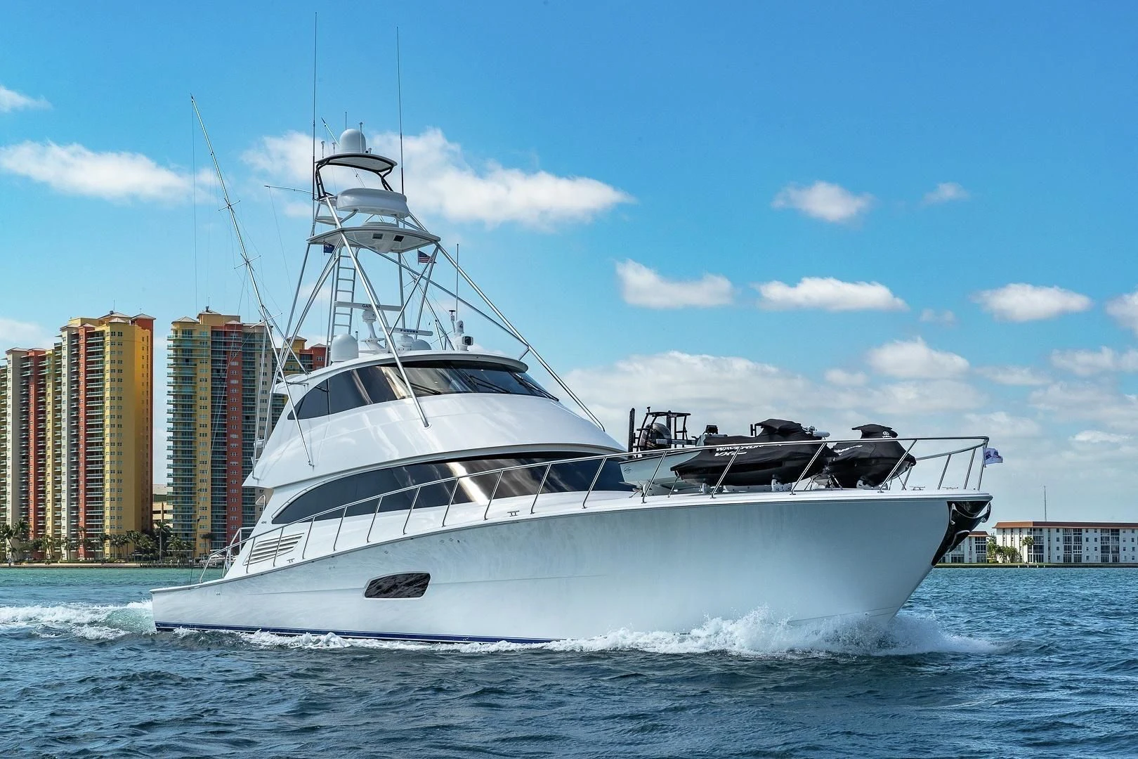 a white yacht on the water aboard AUSSIE RULES Yacht for Sale