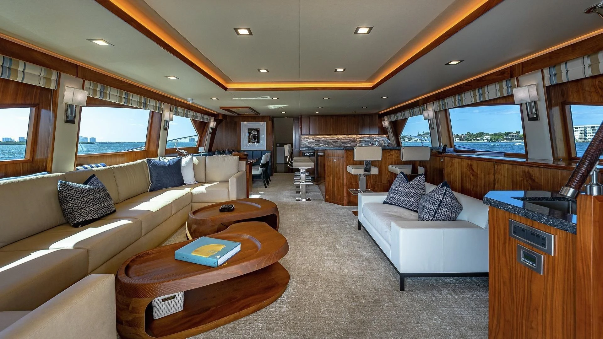 a living room with a couch and a table aboard AUSSIE RULES Yacht for Sale