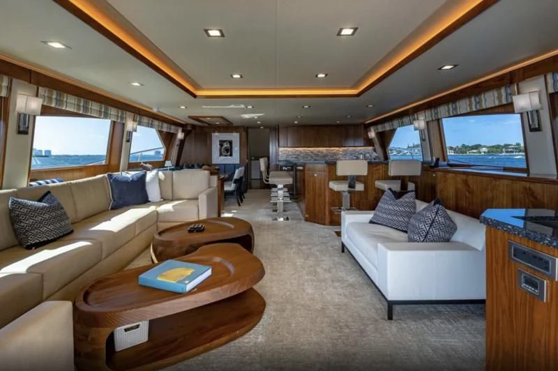 a living room with a couch and a table aboard AUSSIE RULES Yacht for Sale